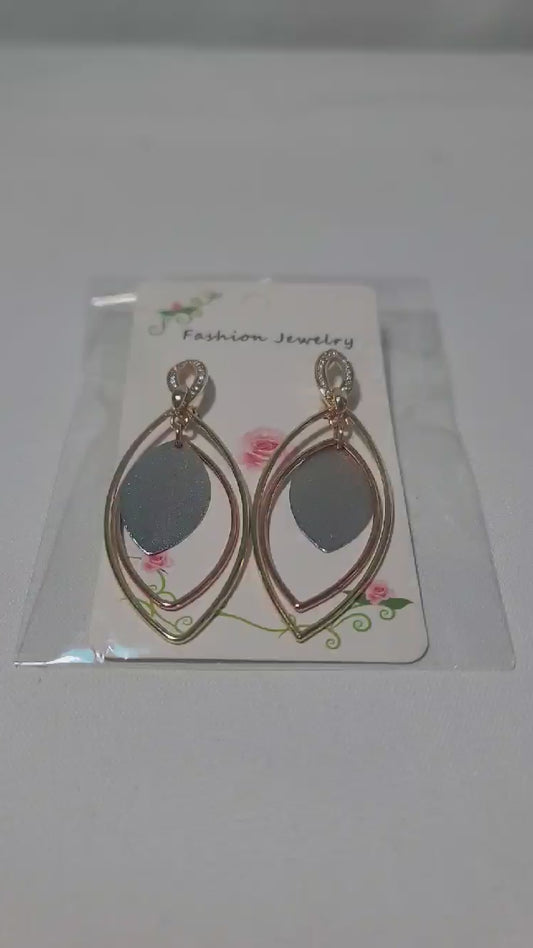 This 3 Tone Elegant Signature Earing is Exclusive to Kathy's Fashion Jewelry.